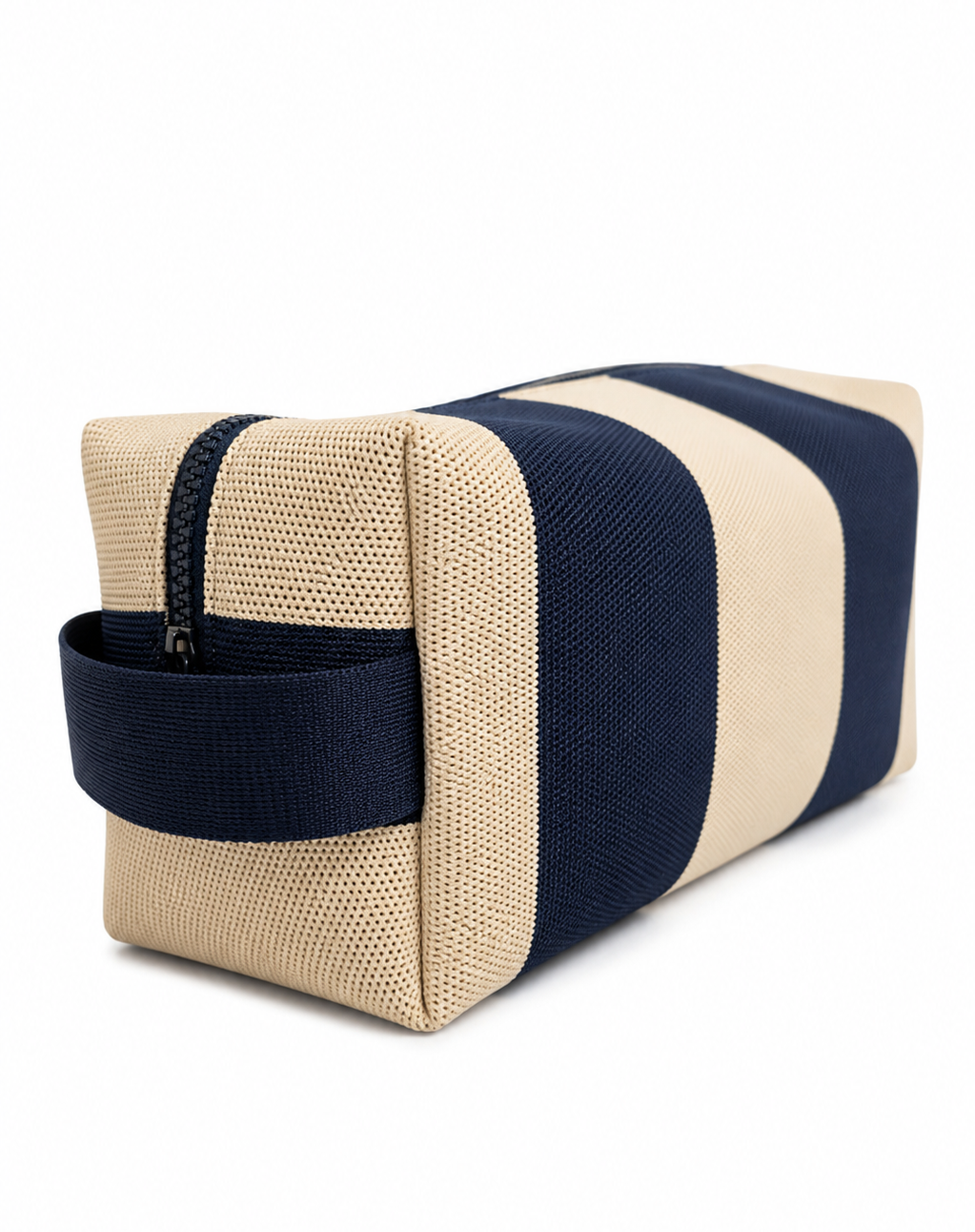 A rectangular zippered toiletry bag with alternating navy blue and beige textured stripes and zipper closure