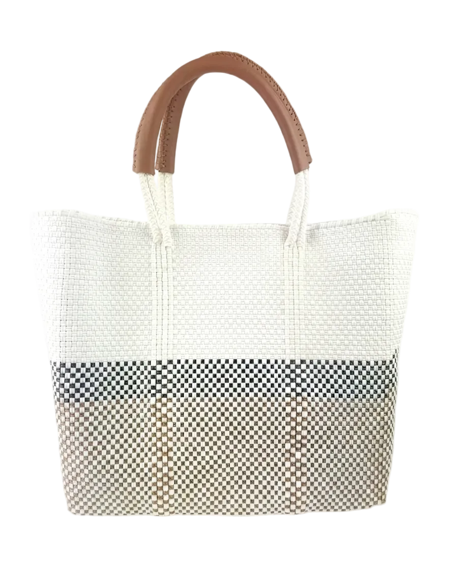 White woven tote bag with a black checkered bottom section and brown handle on a white background