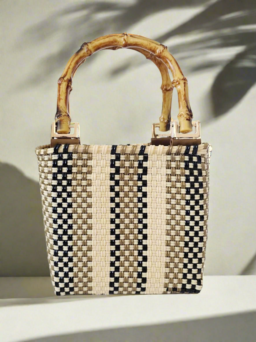 Woven handbag with bamboo handle