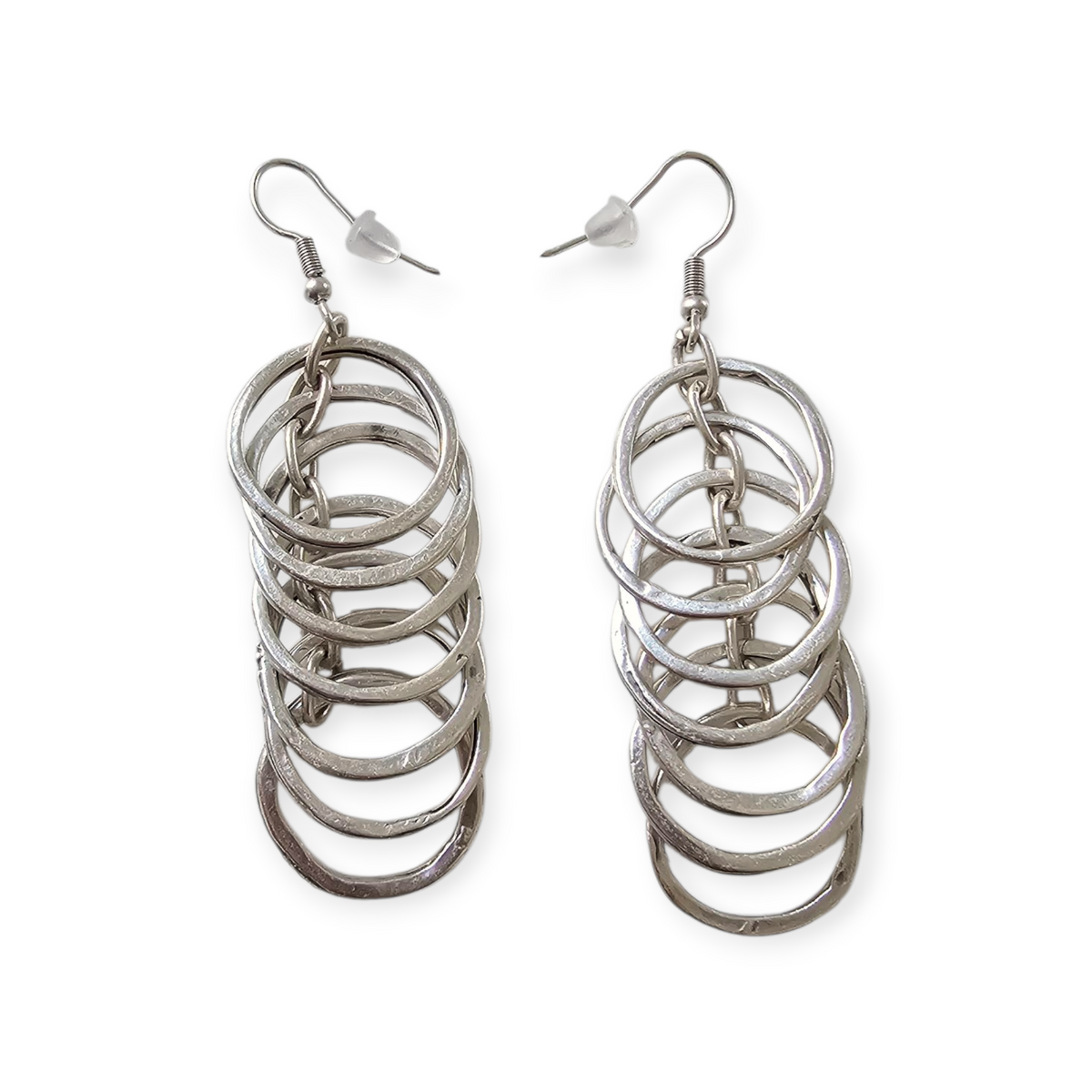 Halo Cascade Earrings: silver-tone cascading circle earrings, full pair.