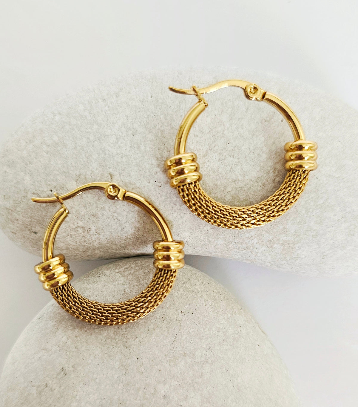 Timeless Hoops Earrings: textured gold-tone hoop earrings displayed as a pair.