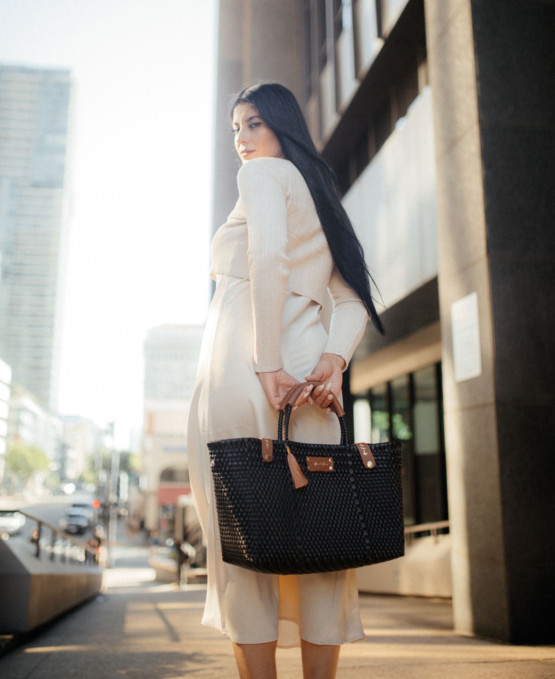 Eco-friendly Less Pollution Handbag in black made from sustainable materials and versatile design