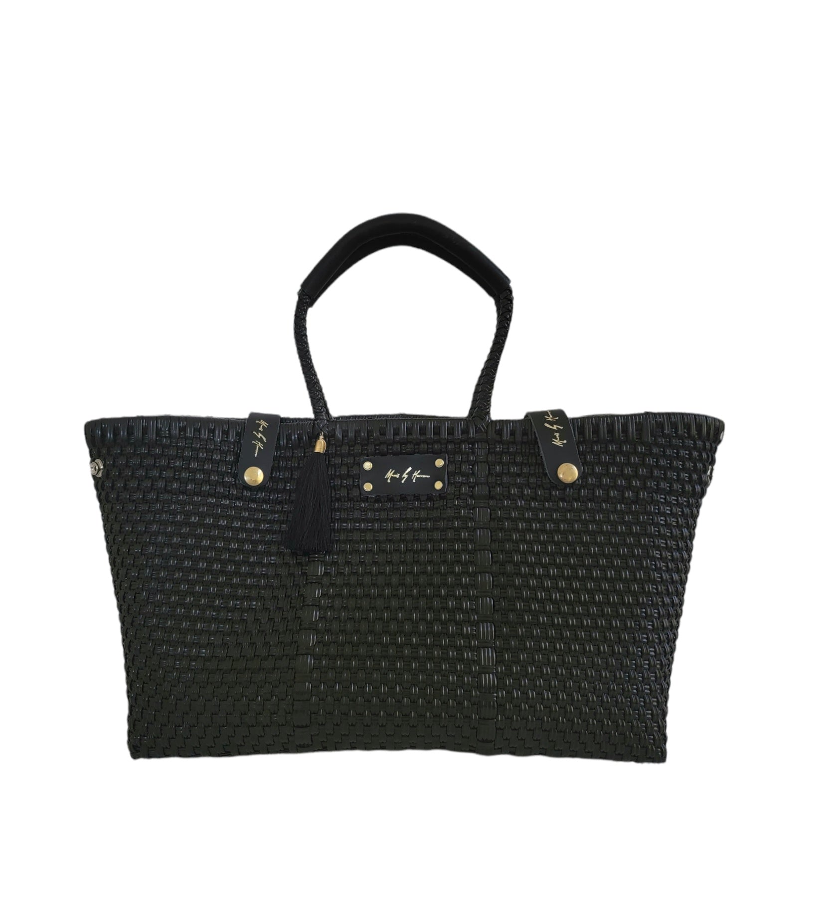 A luxury black tote handbag, sustainably crafted from ethically sourced and recycled plastic and leather.