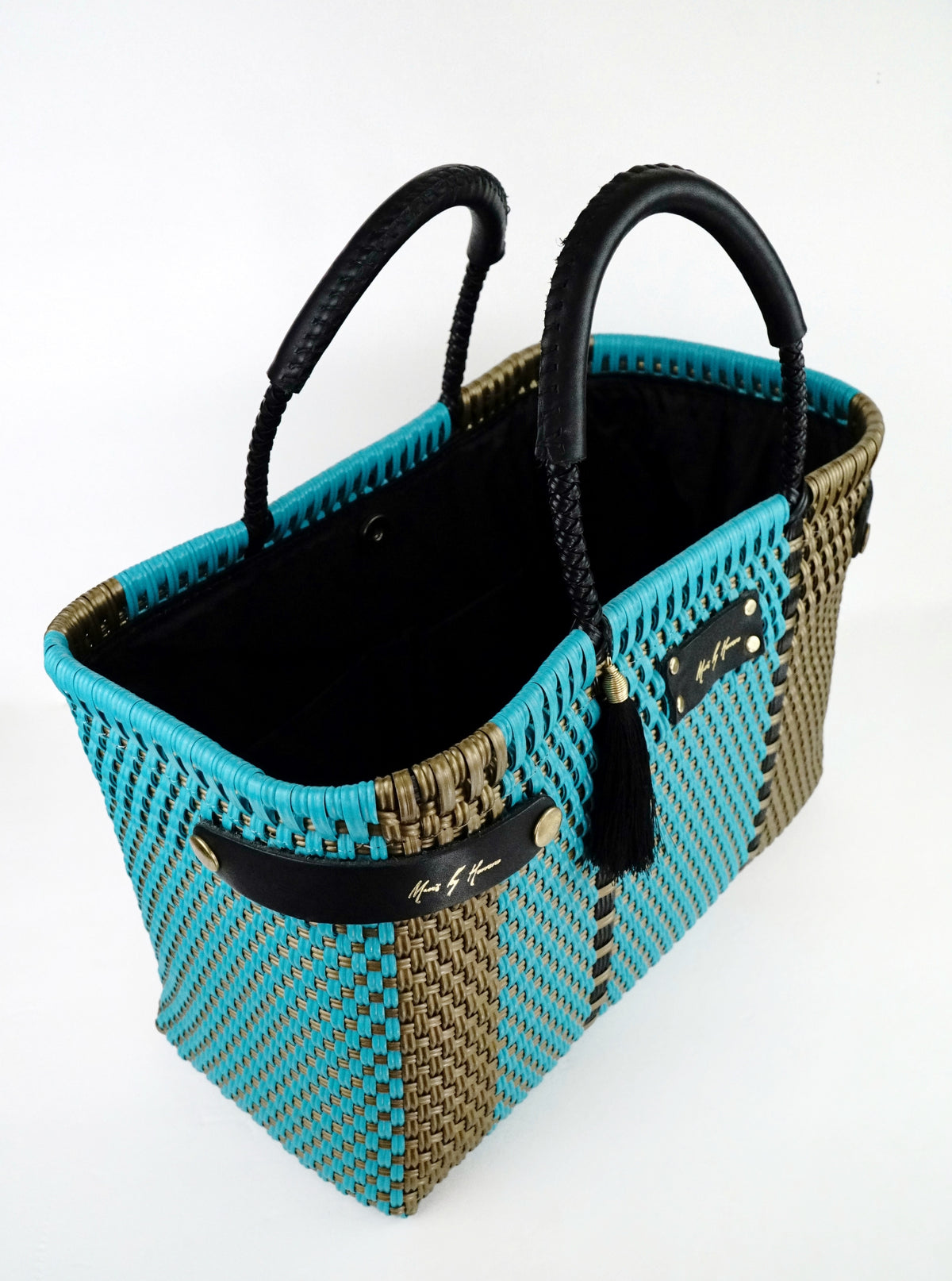 Less Pollution Convertible Handbag to Tote – Aruba — handwoven recycled-plastic convertible handbag and tote by Mavis by Herrera