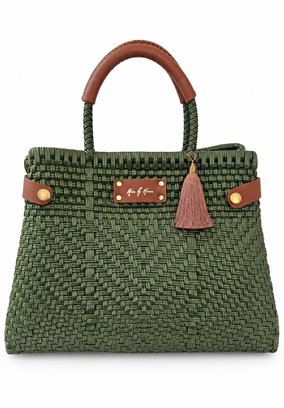 A green woven straw handbag with brown leather top handles, gold-tone hardware, and a brown tassel charm, shown against a plain white background.