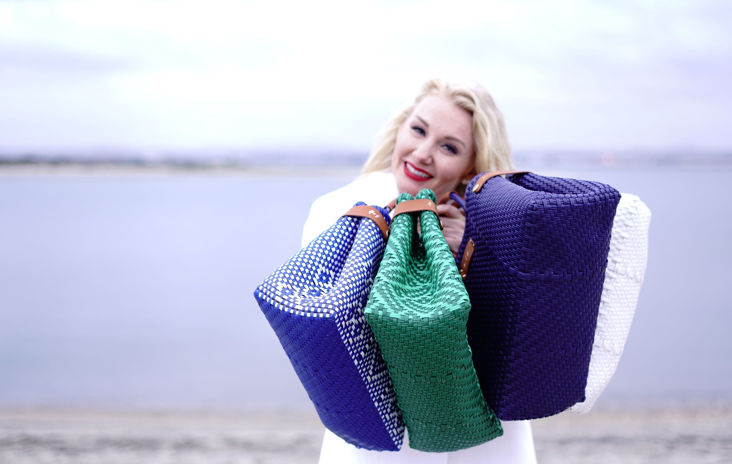 Sustainable luxury handbags. Mavis by Herrera fashion designer. Women owned business minority. Reducing plastic pollution waste. Bags that are good for the planet. 