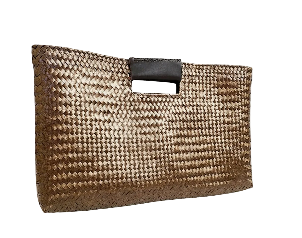 Woven clutch bag with a black handle on a white background