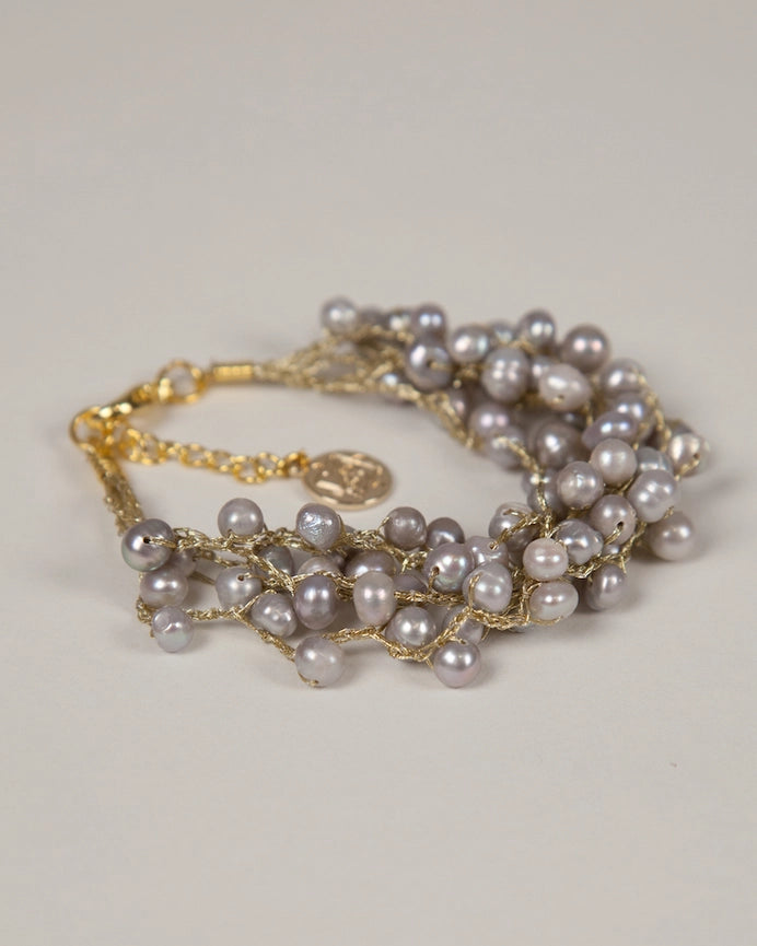 Pearl Enchantment Bracelet on Silk Gold - Baroque: baroque pearl bracelet on gold-colored silk thread.