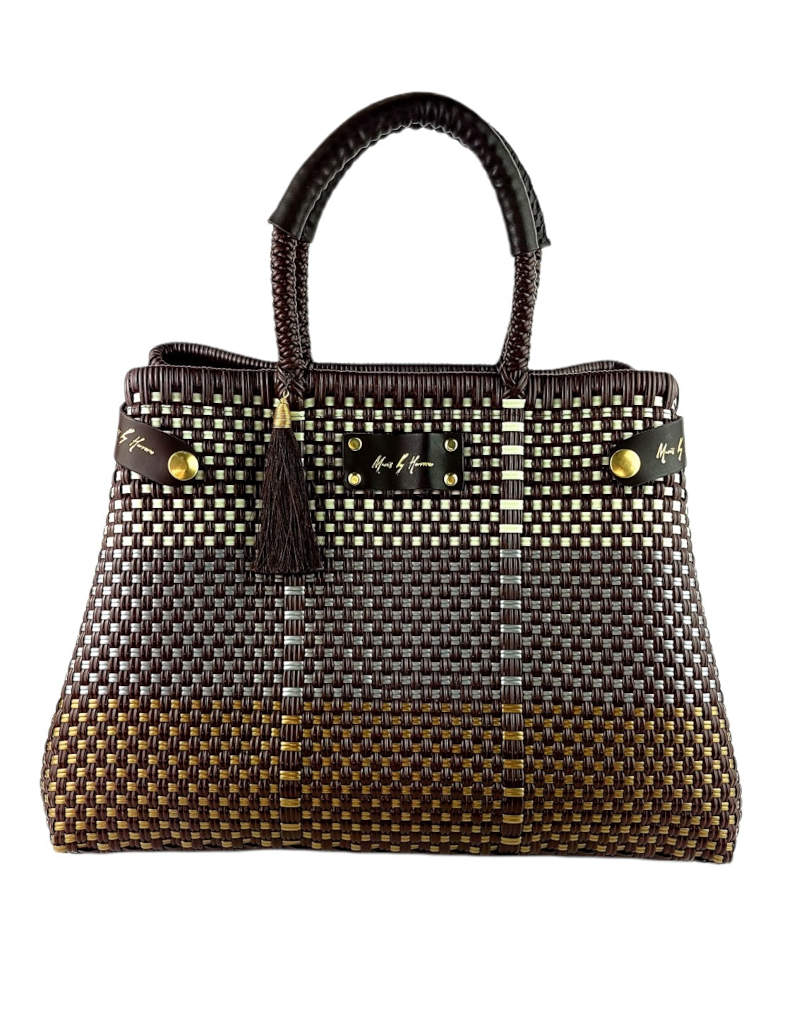 Handcrafted brown handbag made from recycled plastic and leather, with a convertible tote design
